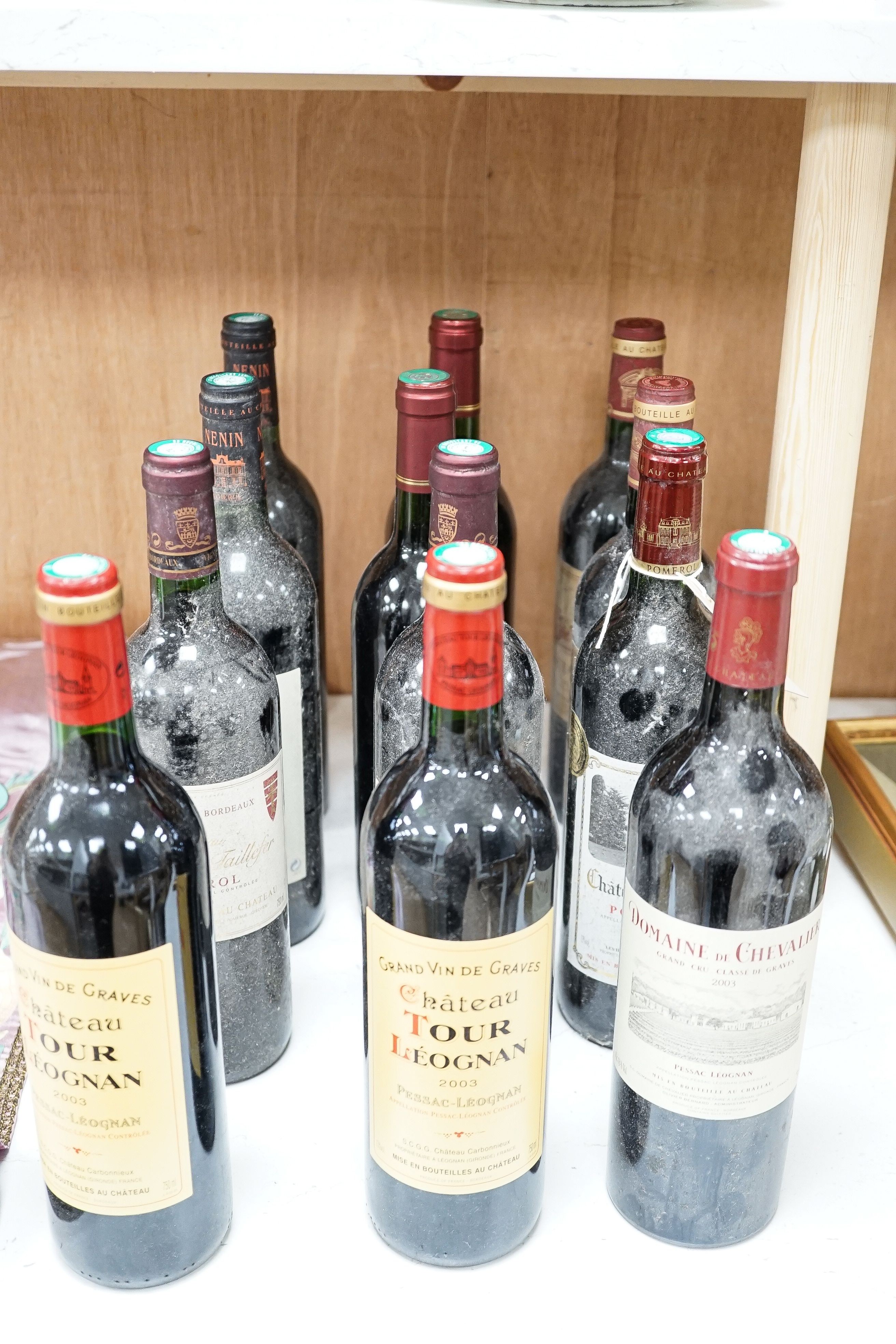 Twelve various bottle of red wine